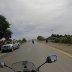 Cambodian road leading to a bridge